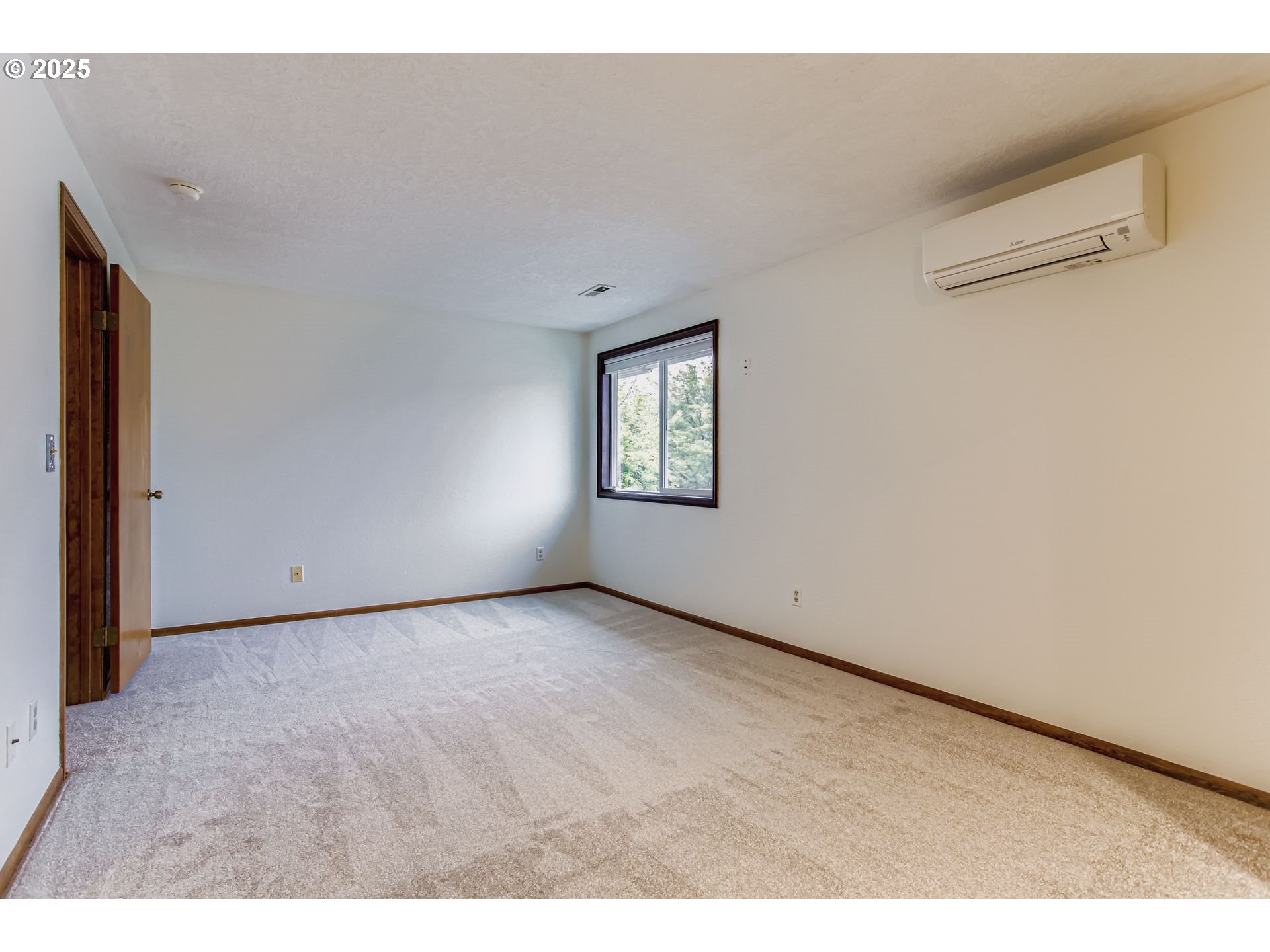 3248 Northeast 29th Street Gresham, OR 97030 - Photo 18 of 40 a view of an empty room with a window