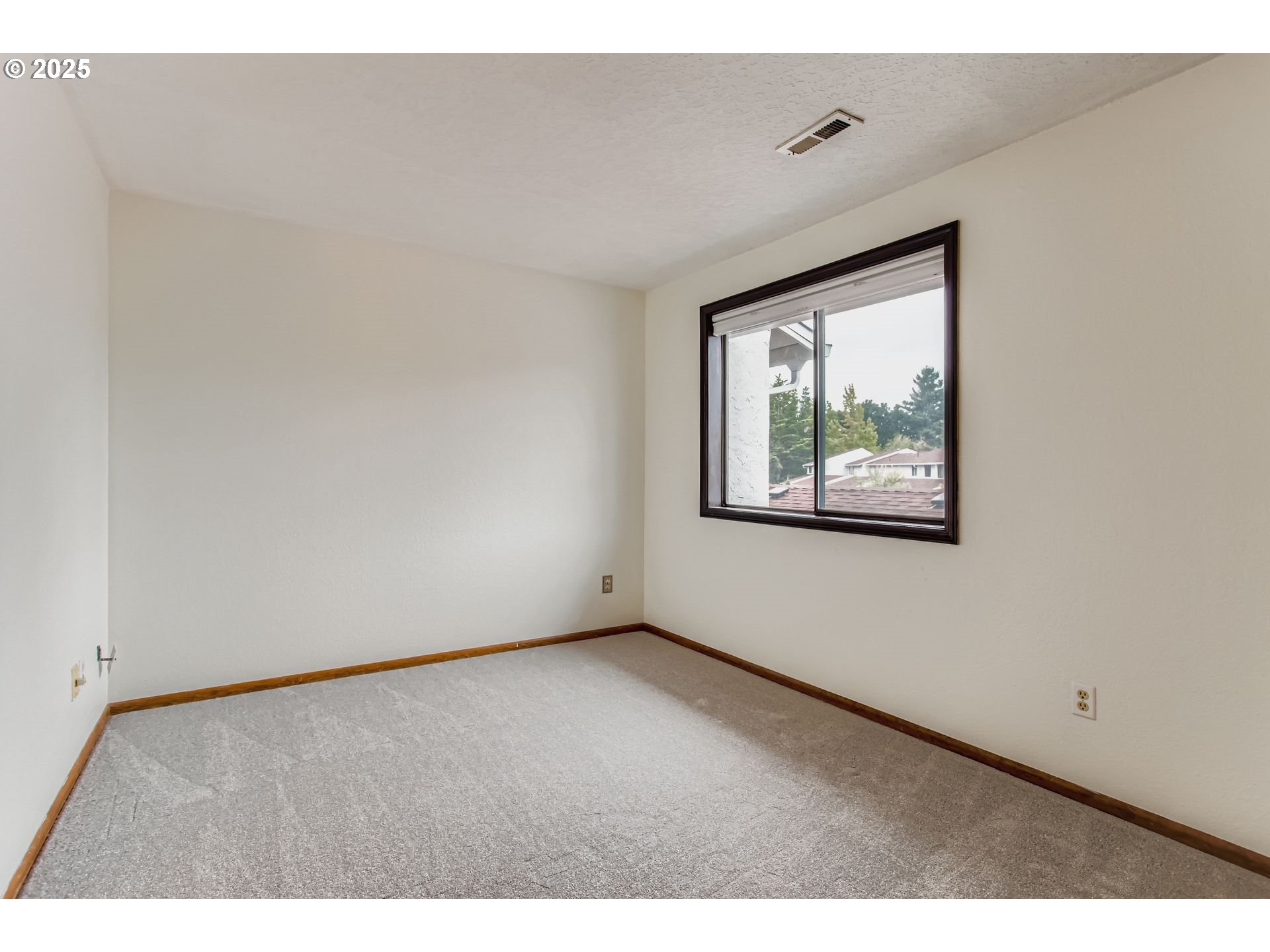 3248 Northeast 29th Street Gresham, OR 97030 - Photo 22 of 40 a view of an empty room with a window