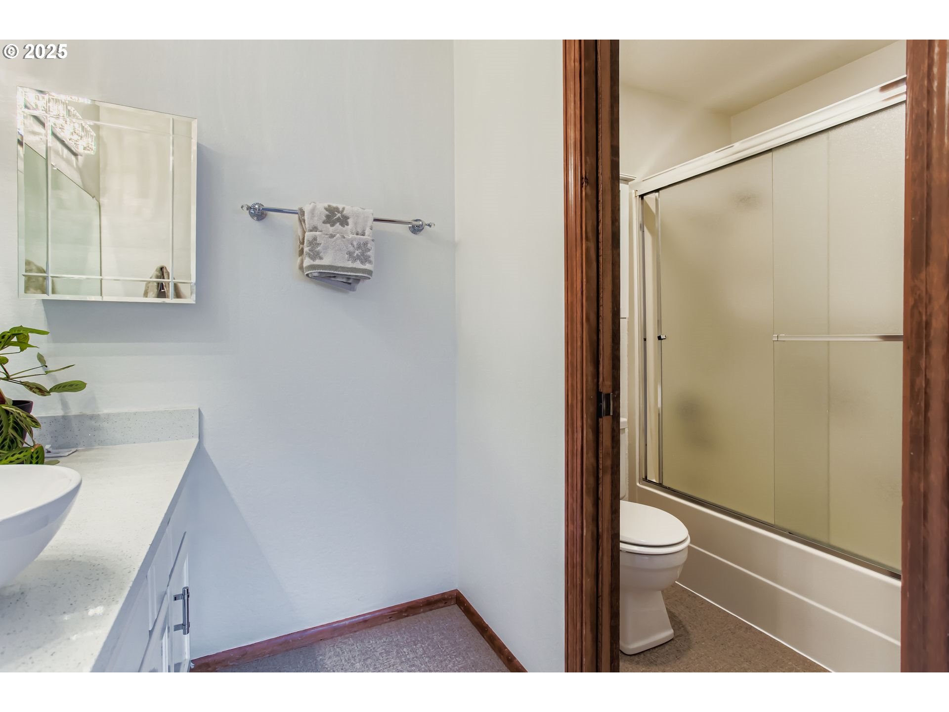 3248 Northeast 29th Street Gresham, OR 97030 - Photo 27 of 40 a bathroom with a sink a toilet and shower