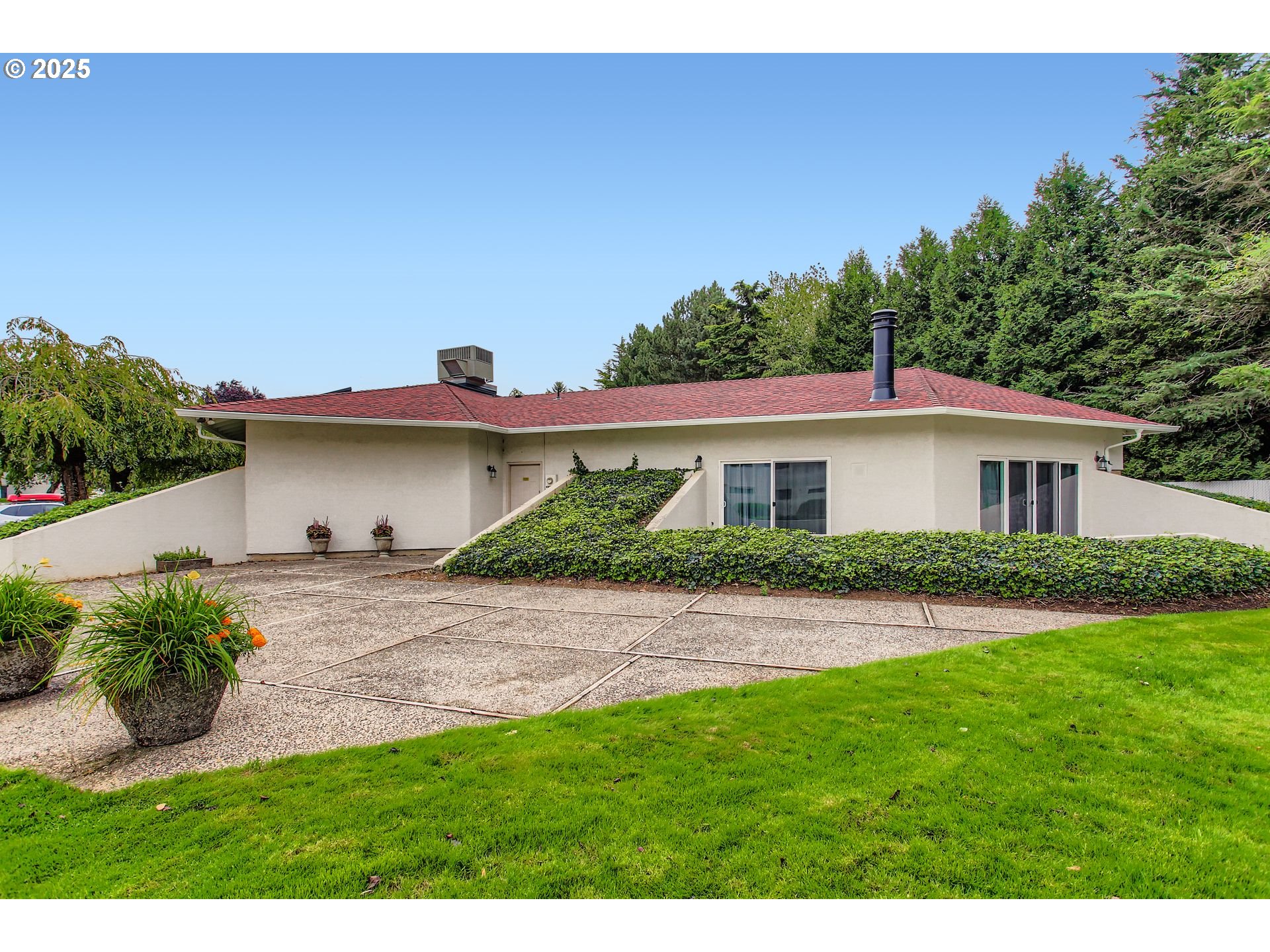 3248 Northeast 29th Street Gresham, OR 97030 - Photo 40 of 40 a front view of a house with a yard and potted plants