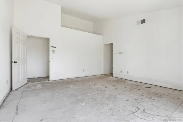 an empty room with natural light