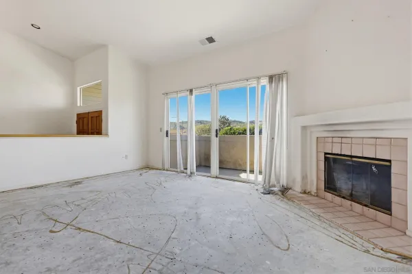 a view of a livingroom with a fireplace