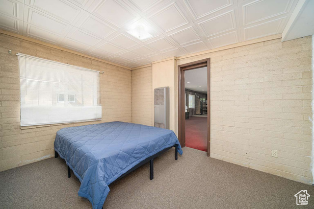 52 South Main Street Paris, ID 83261 - Photo 18 of 27 Bedroom featuring carpet flooring and a heating unit