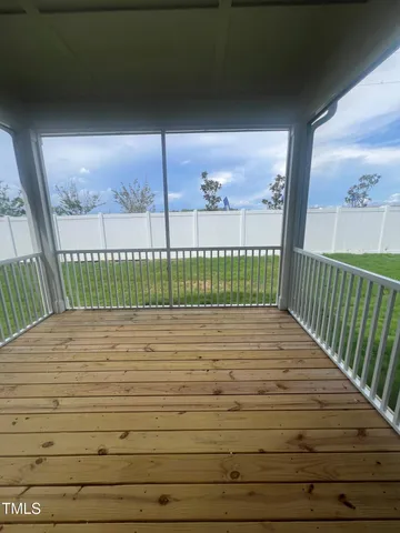 a view of a balcony with an outdoor space