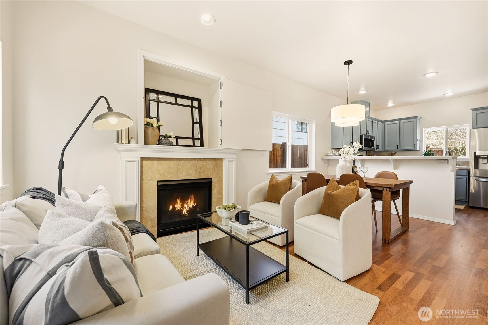 8847 9th Avenue Southwest, Unit A Seattle, WA 98106 - Photo 12 of 31 a living room with furniture and a fireplace
