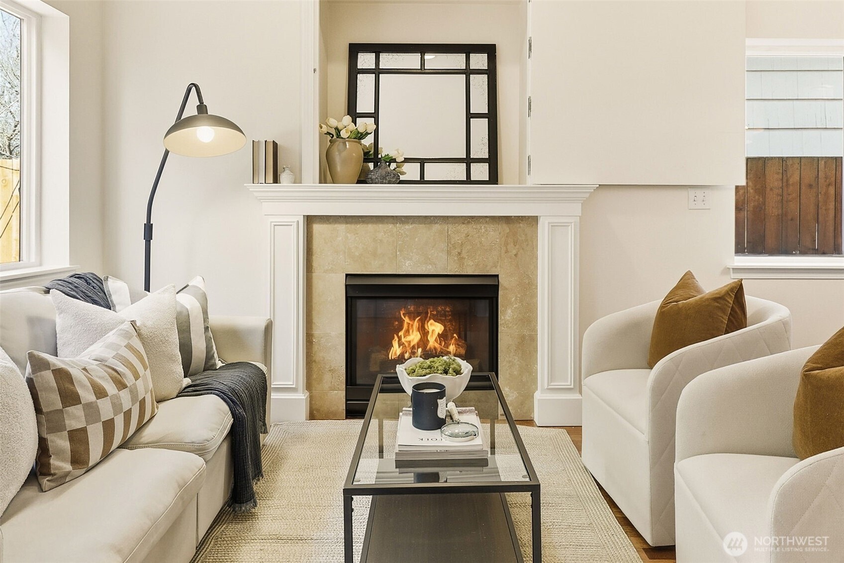 8847 9th Avenue Southwest, Unit A Seattle, WA 98106 - Photo 13 of 31 a living room with furniture and a fireplace