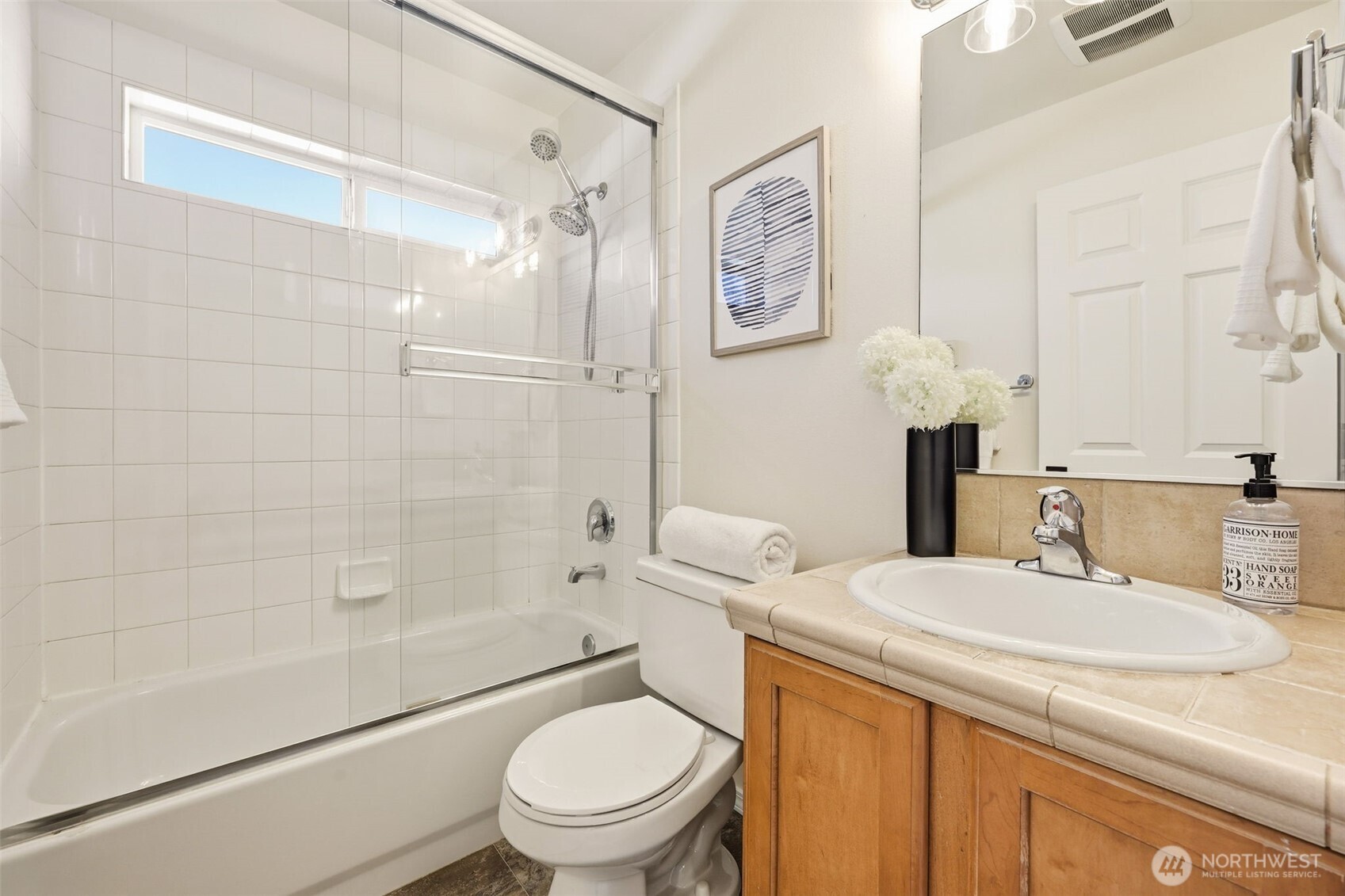 8847 9th Avenue Southwest, Unit A Seattle, WA 98106 - Photo 16 of 31 a bathroom with a sink toilet and shower