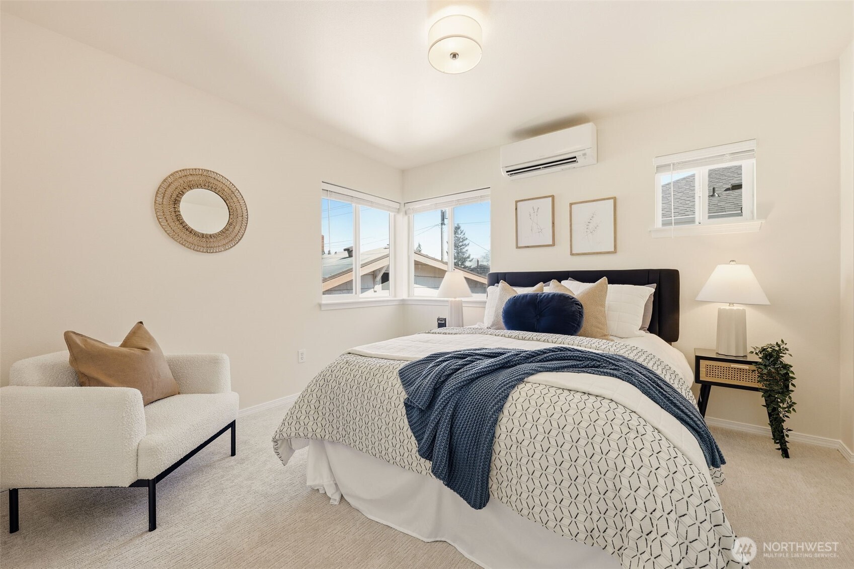 8847 9th Avenue Southwest, Unit A Seattle, WA 98106 - Photo 19 of 31 a bed room with a bed and a couch