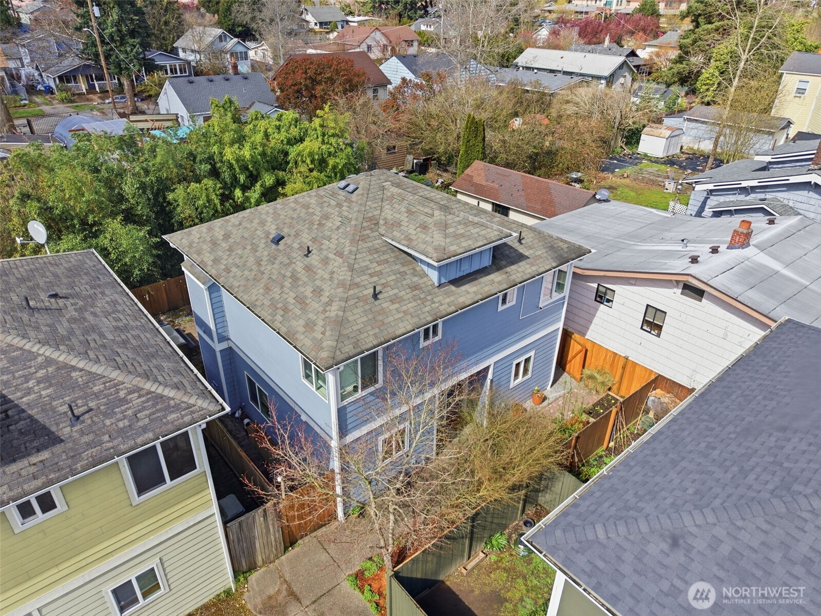 8847 9th Avenue Southwest, Unit A Seattle, WA 98106 - Photo 26 of 31 an aerial view of a house with a swimming pool