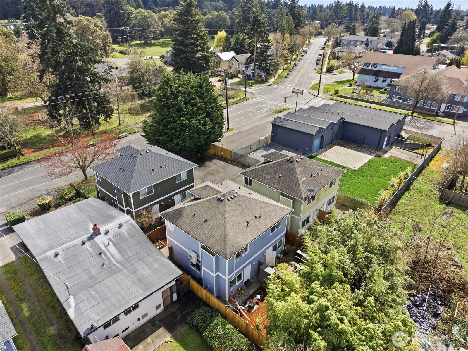 8847 9th Avenue Southwest, Unit A Seattle, WA 98106 - Photo 27 of 31 an aerial view of a house with a garden and lake view