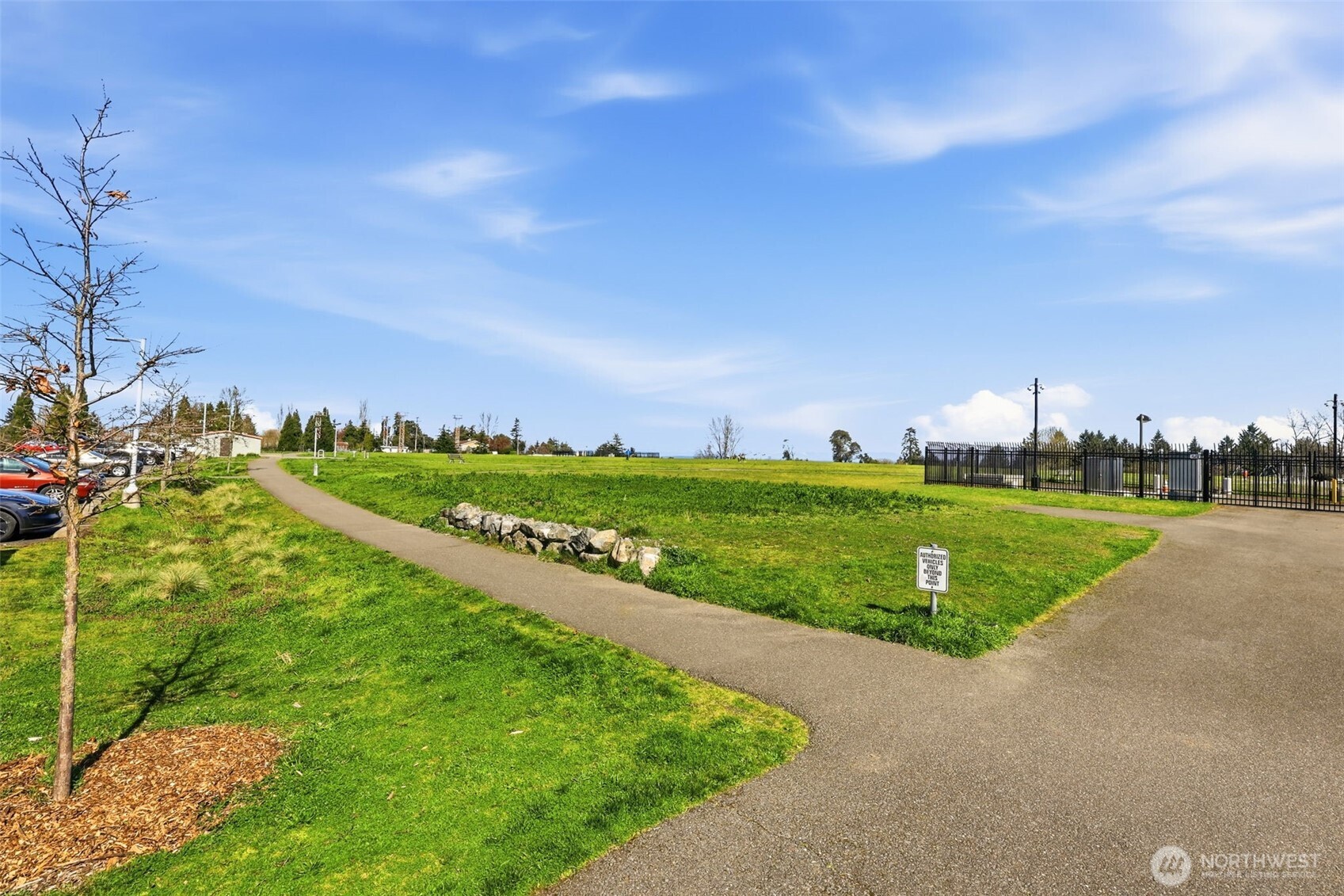 8847 9th Avenue Southwest, Unit A Seattle, WA 98106 - Photo 30 of 31 a view of a golf course with a garden