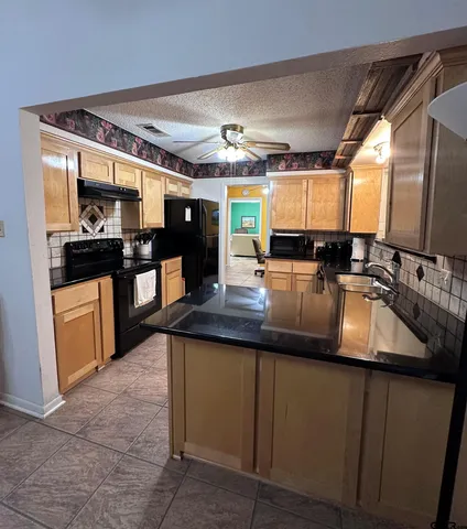 a kitchen with lots of counter top space