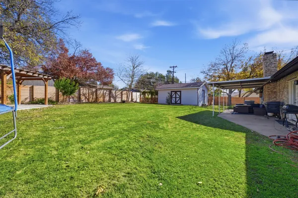 a view of a house with a big yard