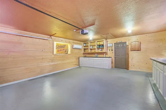 a view of a garage with furniture