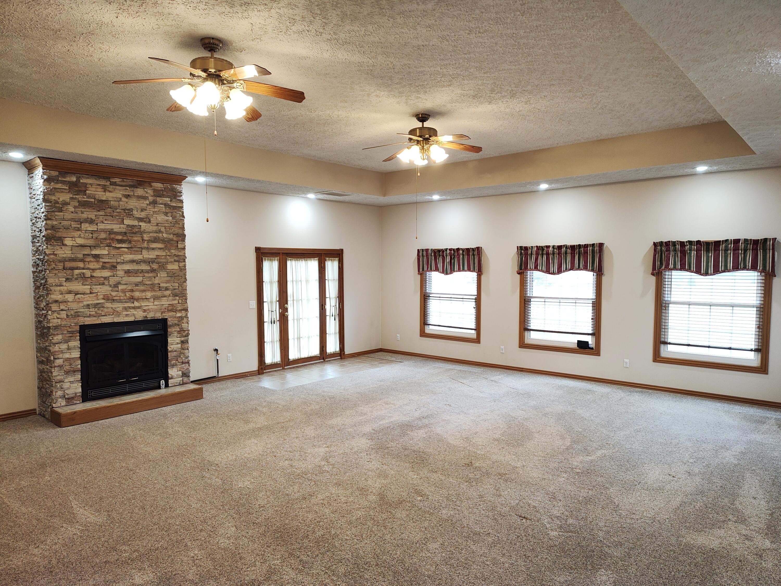 4107 South 118th Road Bolivar, MO 65613 - Photo 17 of 48 Great room wtih fireplace