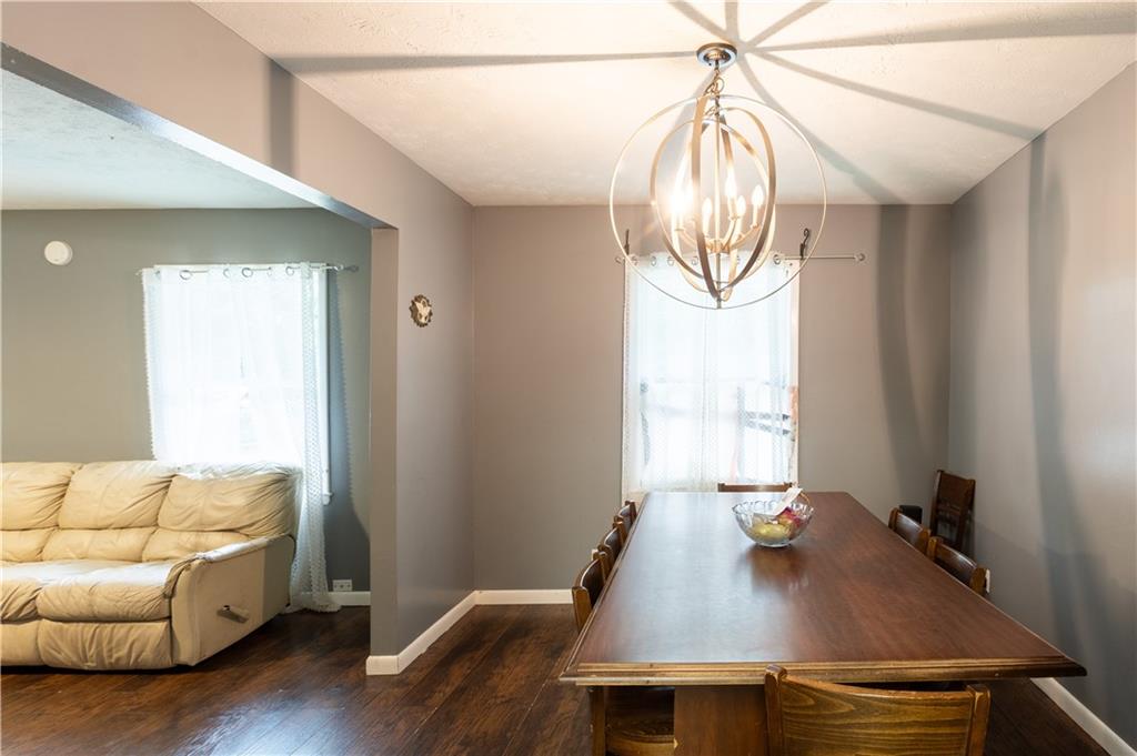 1535 Flat Shoals Road Southwest Conyers, GA 30094 - Photo 4 of 21 a view of a livingroom with furniture and window