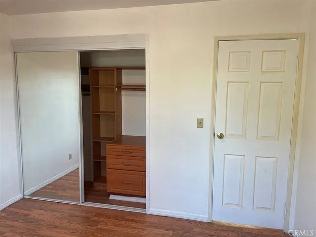 a view of a bedroom from a hallway