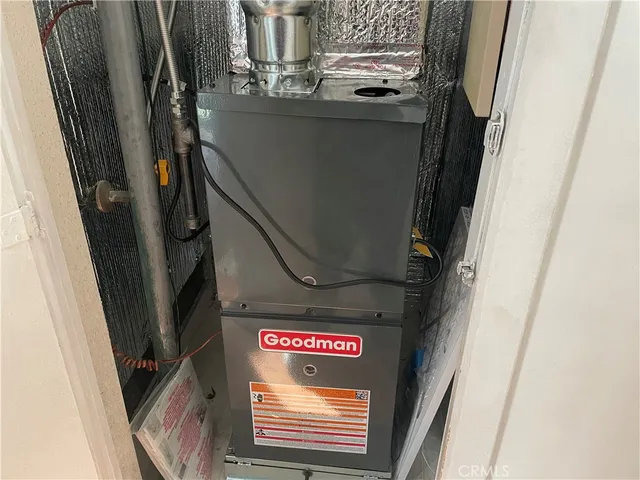 a view of an empty room and floor to ceiling window