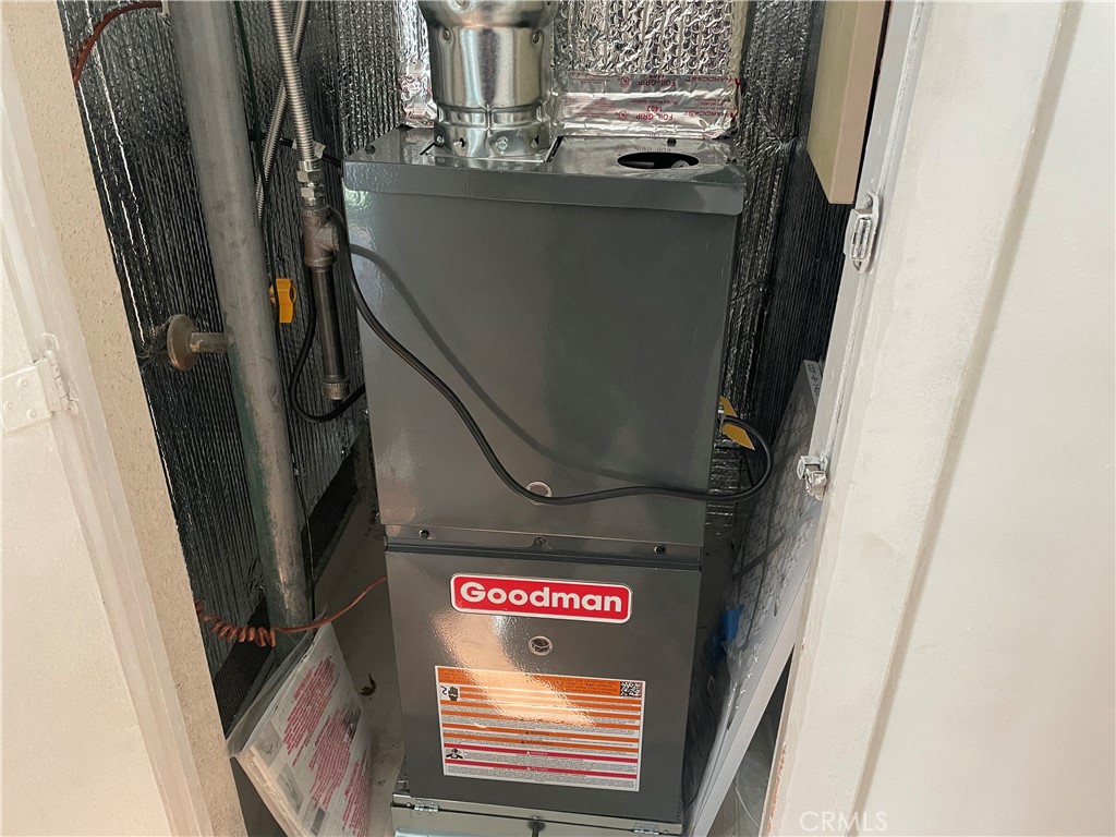 825 Sonora Road Costa Mesa, CA 92626 - Photo 24 of 37 a close view of water heater room