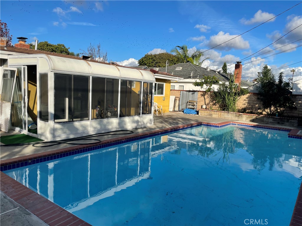 825 Sonora Road Costa Mesa, CA 92626 - Photo 28 of 37 a view of a house with a swimming pool
