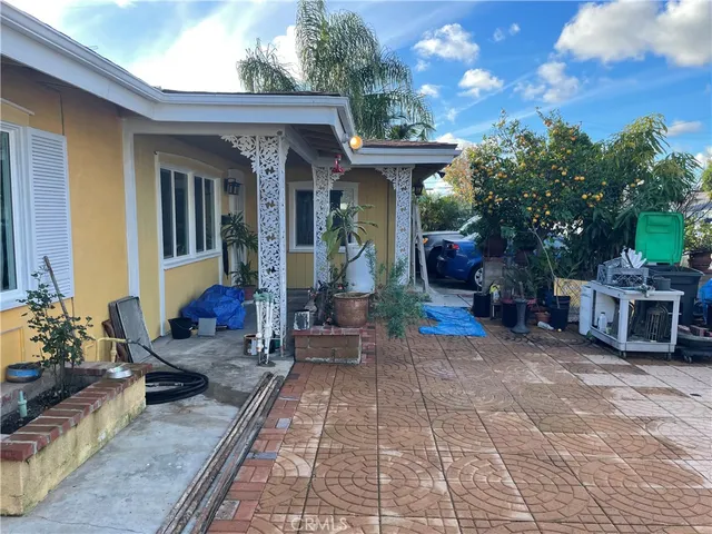 a view of a porch with furniture