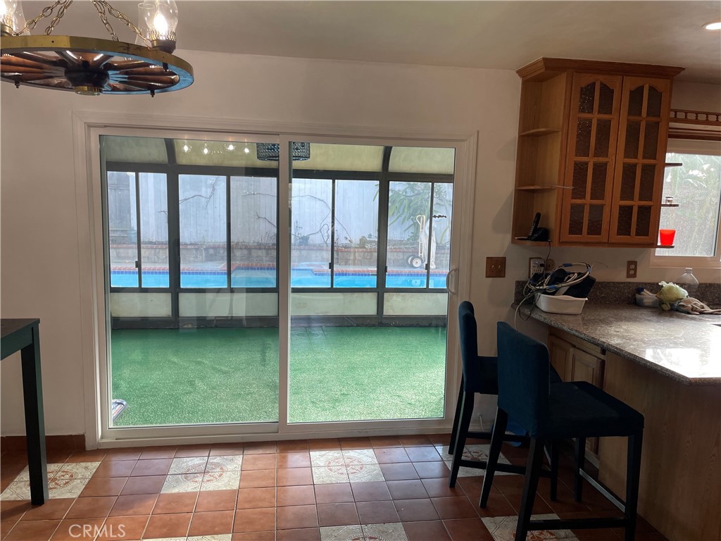 825 Sonora Road Costa Mesa, CA 92626 - Photo 10 of 37 a room with a window and pool table