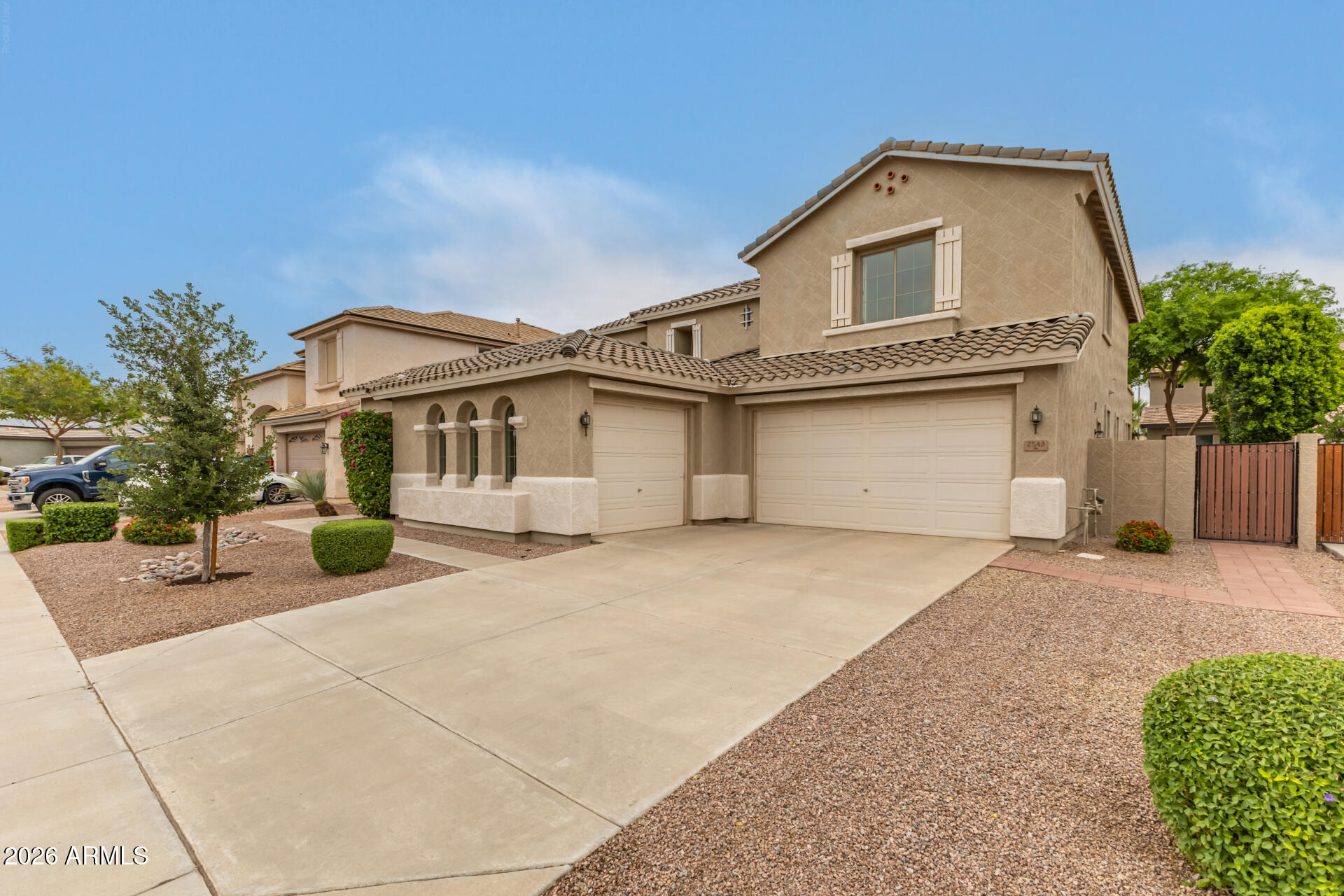 Front of home with 3 car garage