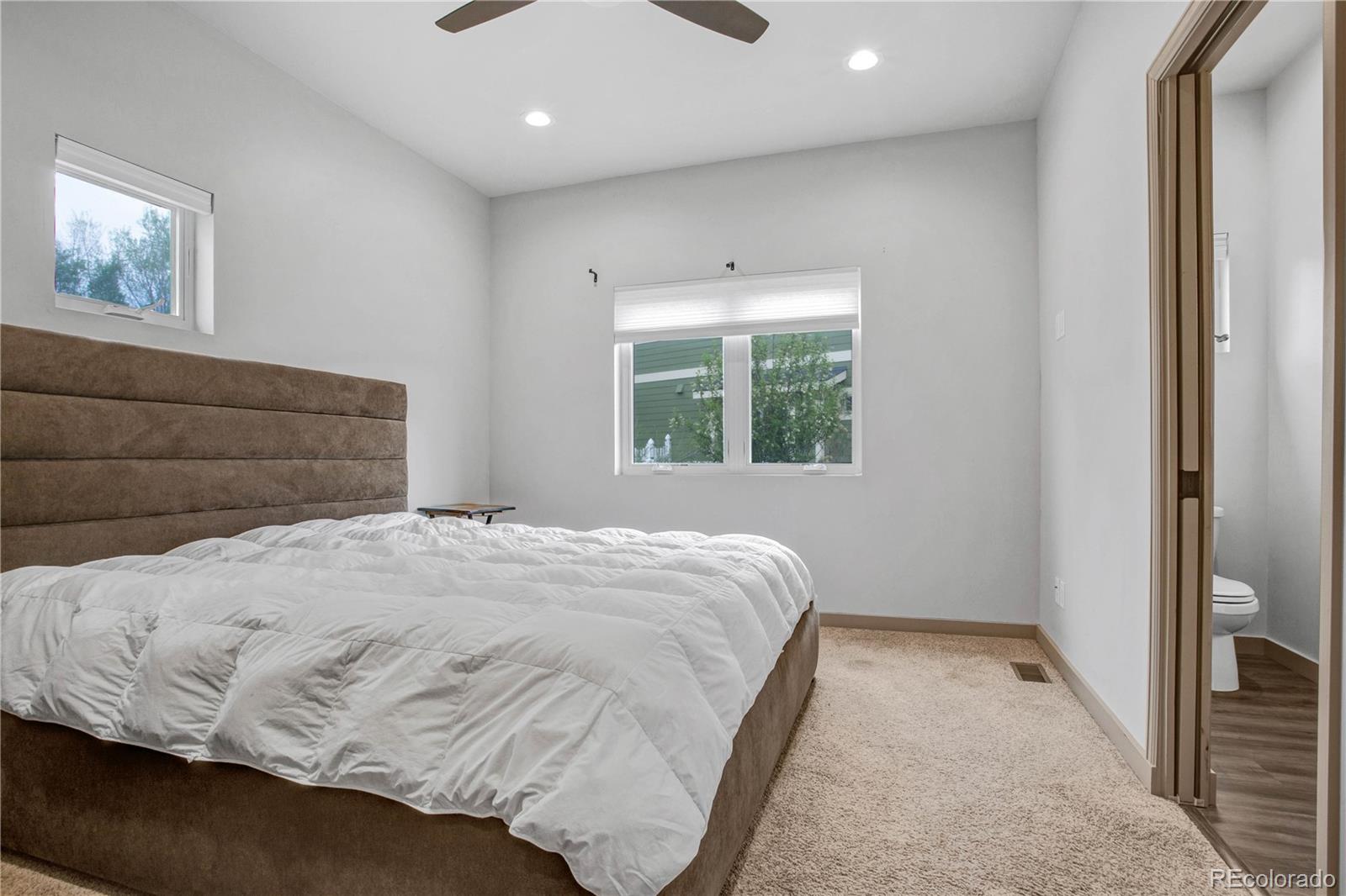 32 Trailside Circle, Unit A Salida, CO 81201 - Photo 16 of 30 a bedroom with a bed and a window
