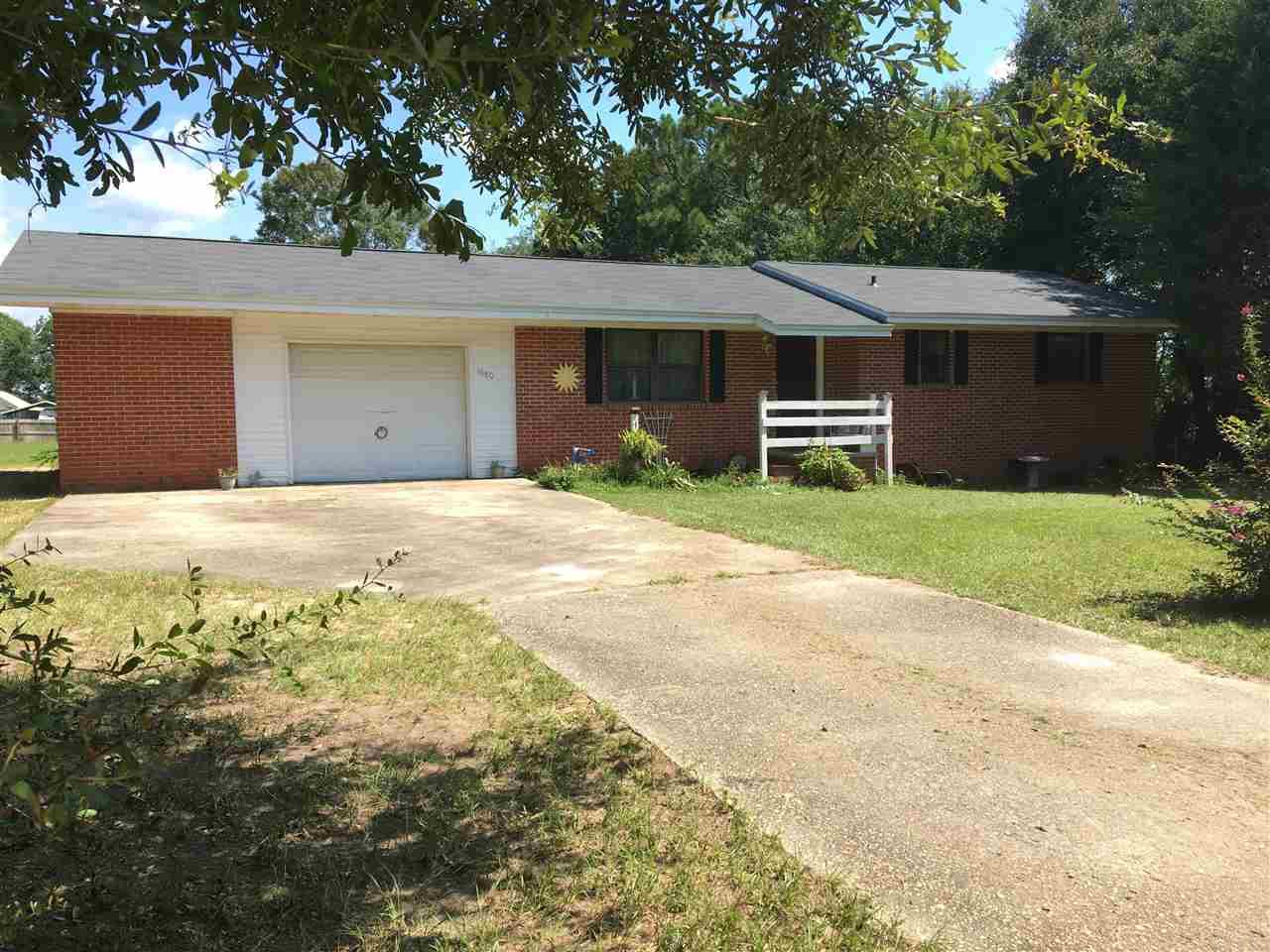 1680 McKenzie Road Cantonment, FL 32533 - Photo 1 of 40 Front Flowers