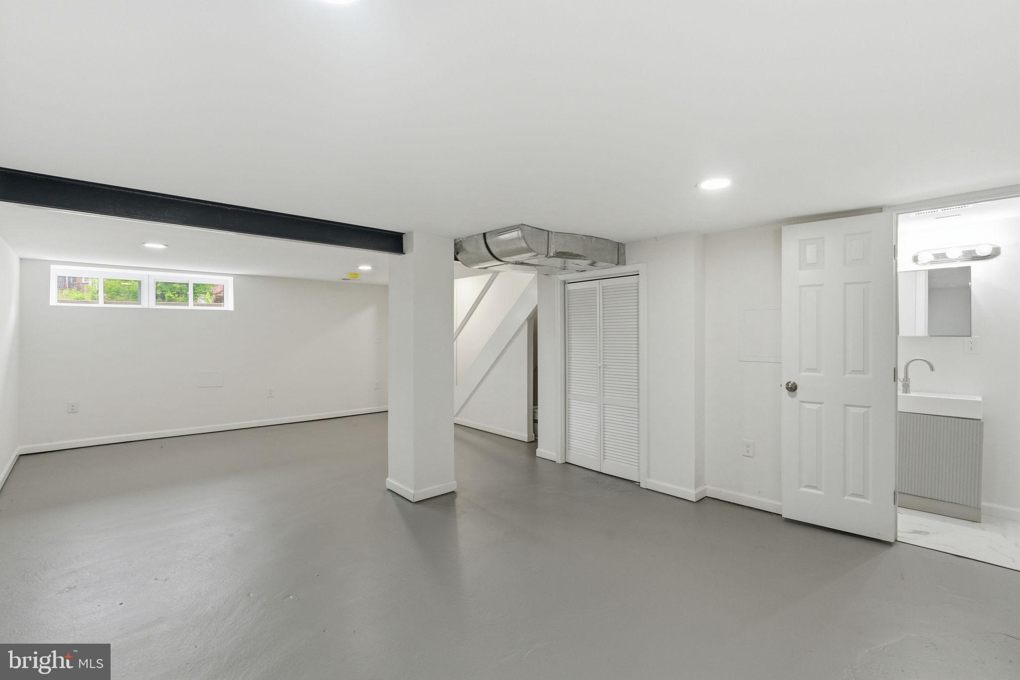 4111 Roland View Avenue Baltimore, MD 21215 - Photo 15 of 19 Spacious, versatile basement retreat.