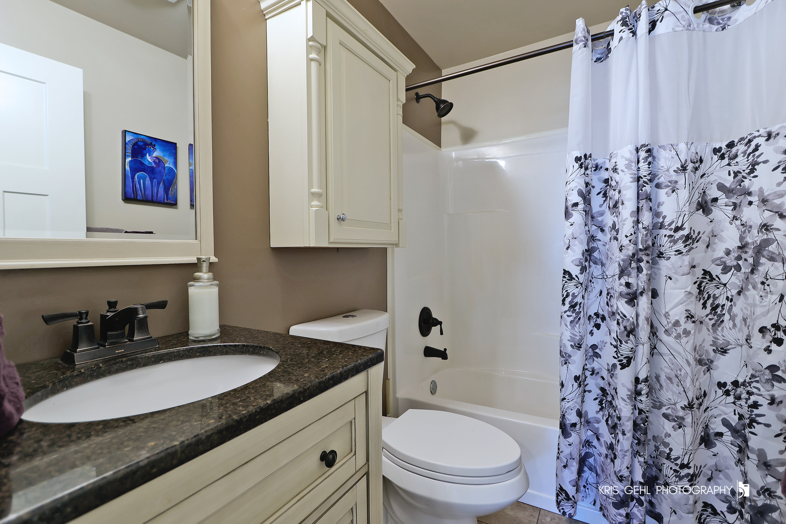 5310 Oak Park Road Oakwood Hills, IL 60013 - Photo 12 of 17 a bathroom with a granite countertop sink and a mirror