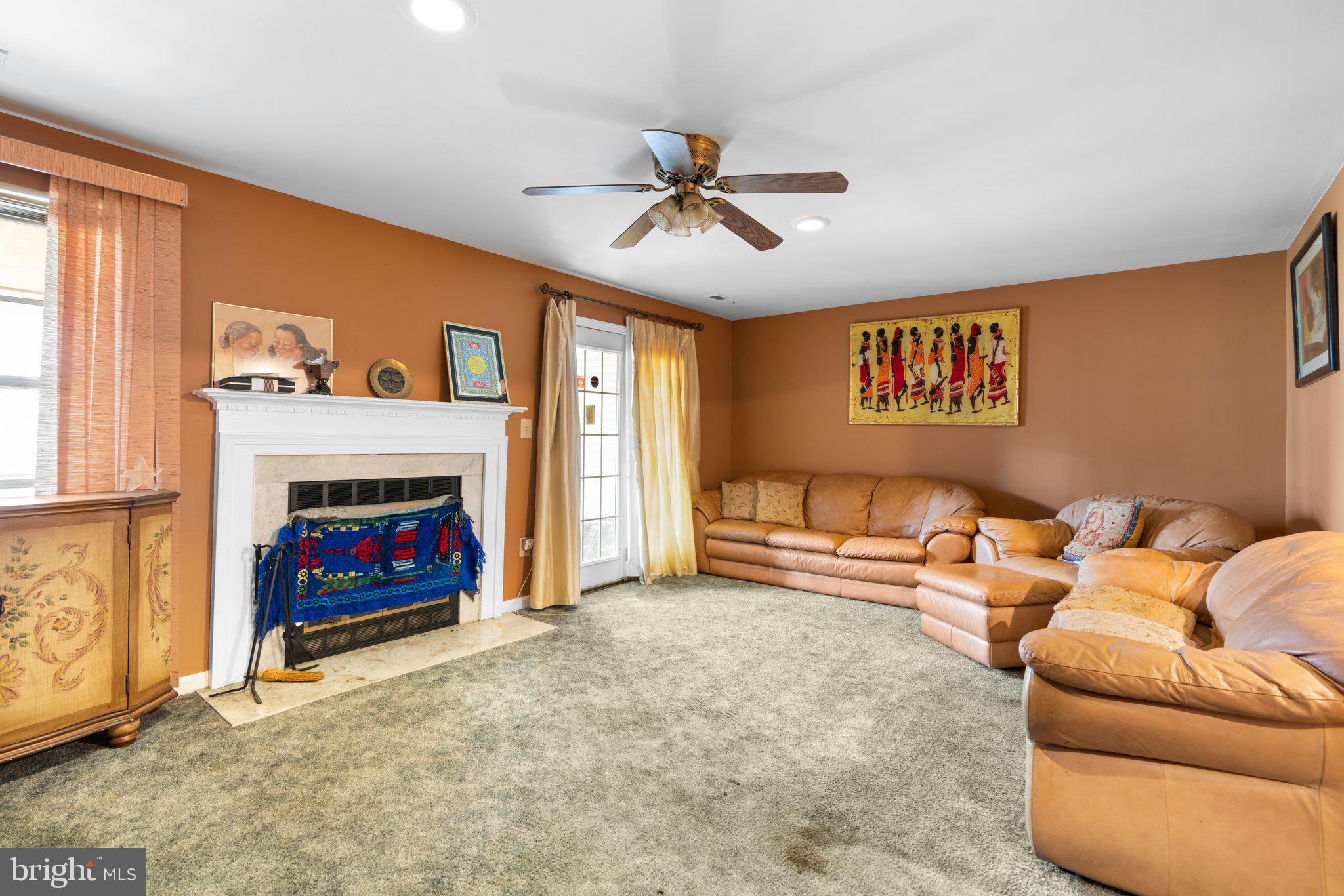 15015 Shamrock Ridge Road Silver Spring, MD 20906 - Photo 24 of 27 Lower Level Rec Room with Fireplace and Walk Out