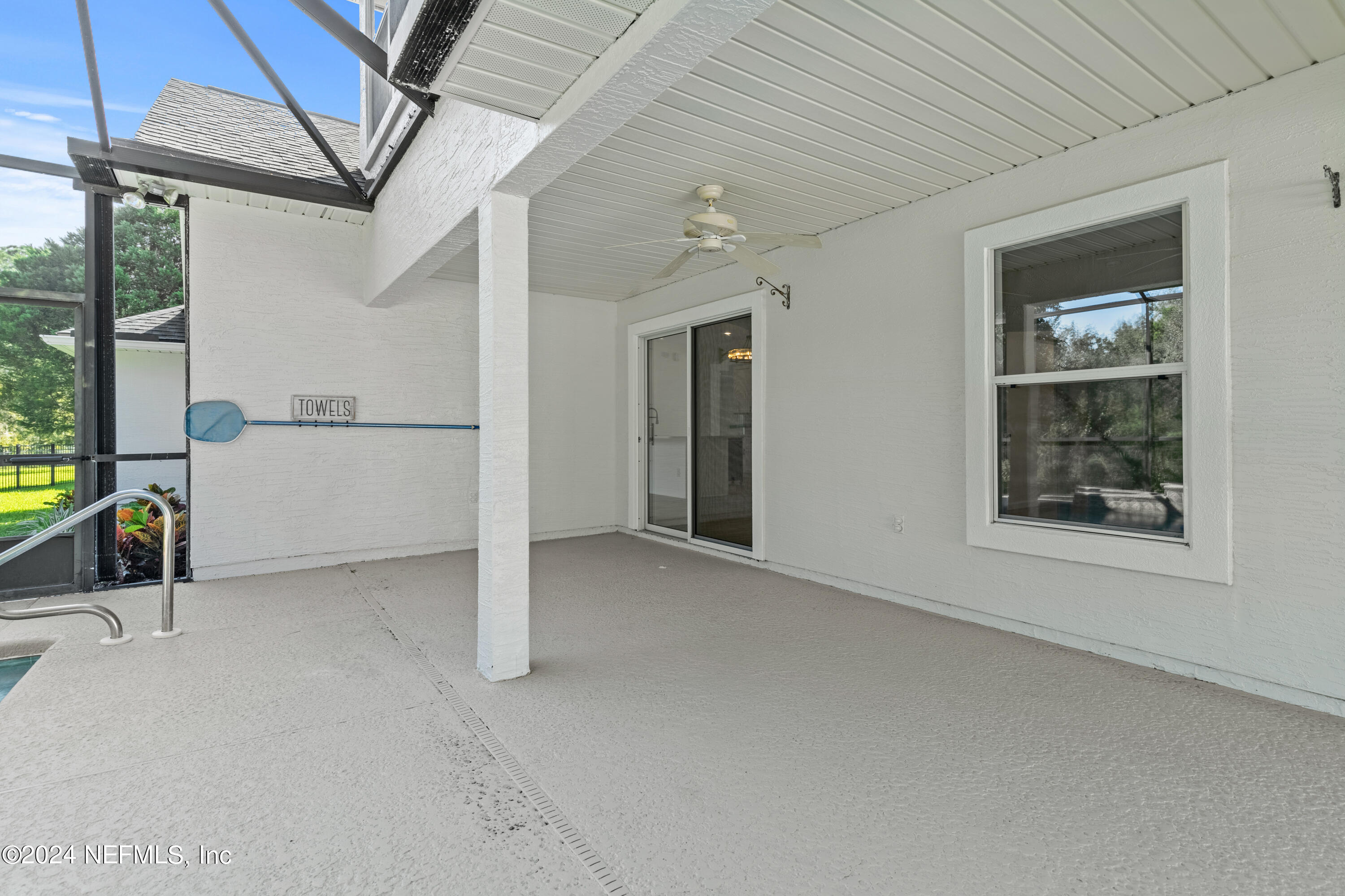 156 Bilbao Drive St. Augustine, FL 32086 - Photo 52 of 57 a view of an empty room with a window