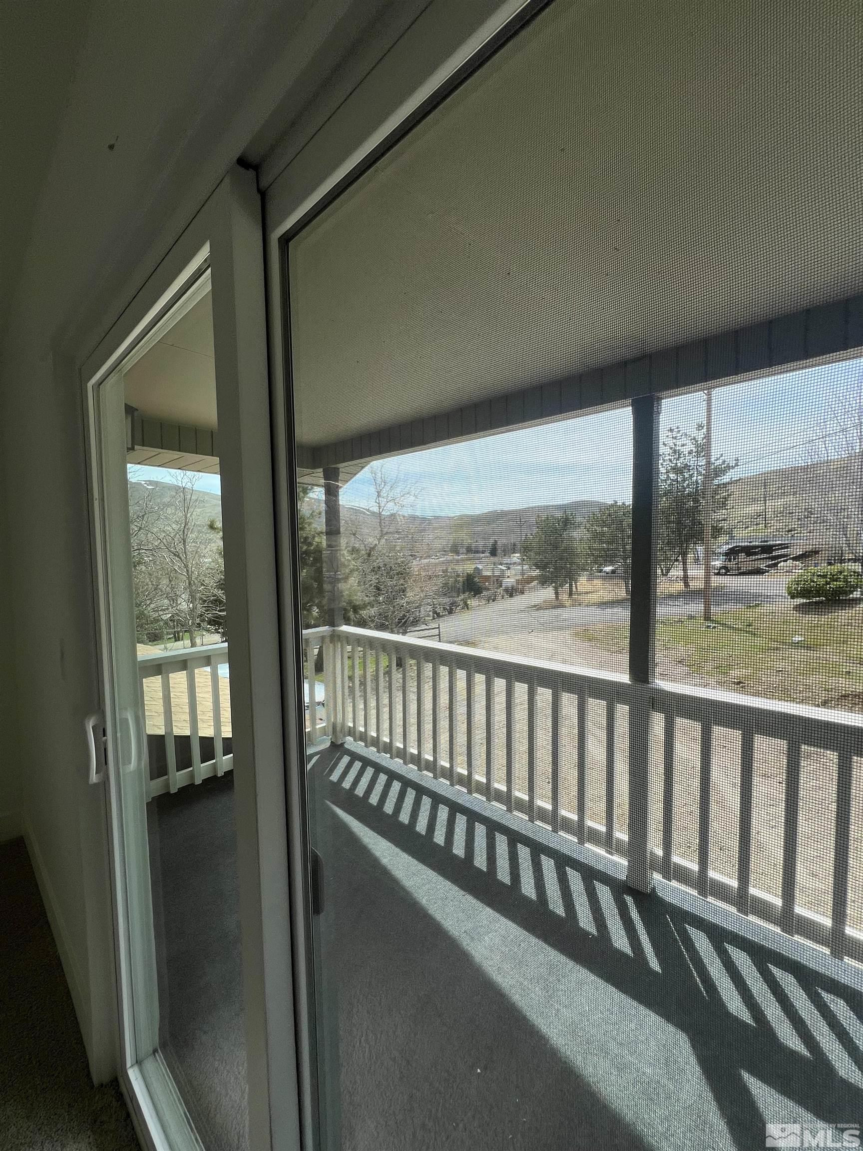 105 Cheyenne Drive Reno, NV 89521 - Photo 12 of 25 a view of a balcony with wooden floor