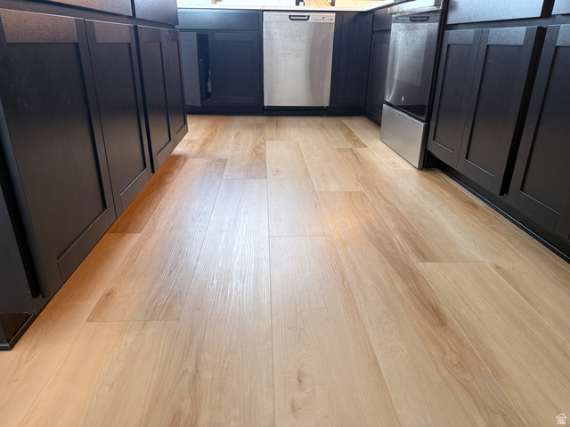 774 West 480 South American Fork, UT 84003 - Photo 13 of 76 Light wood-finish flooring complemented by dark cabinetry