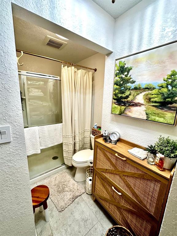 4749 Sunny Loop, Unit 4749 Holiday, FL 34690 - Photo 18 of 34 a living room with furniture and a large window