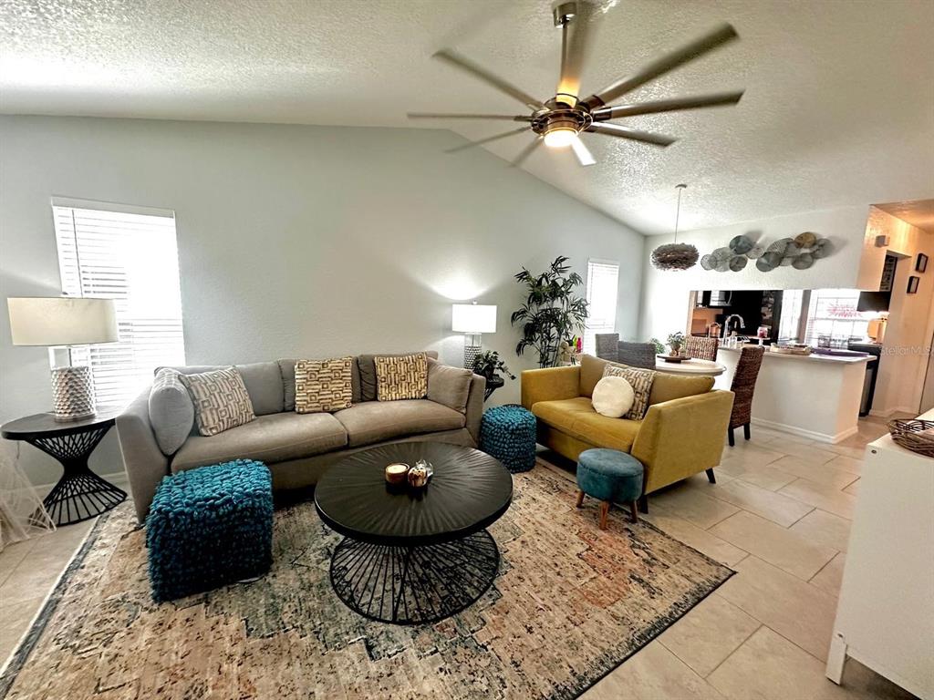 4749 Sunny Loop, Unit 4749 Holiday, FL 34690 - Photo 2 of 34 a living room with furniture