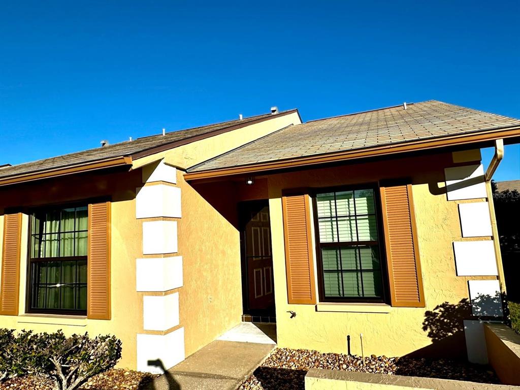 4749 Sunny Loop, Unit 4749 Holiday, FL 34690 - Photo 27 of 34 a view of entryway with a front door