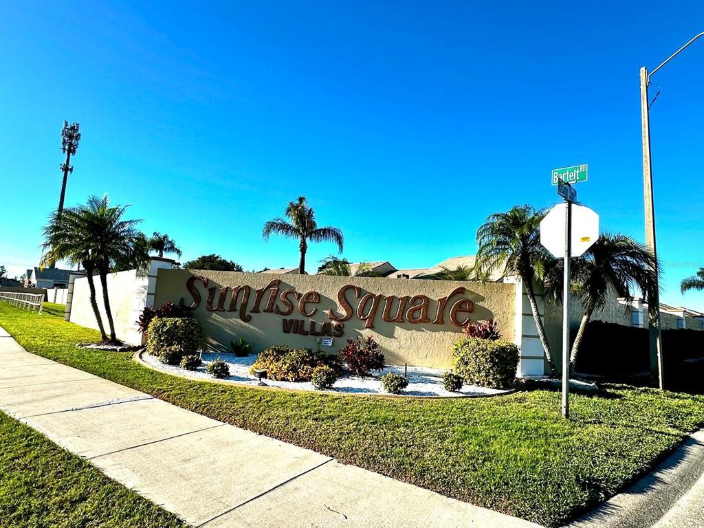 4749 Sunny Loop, Unit 4749 Holiday, FL 34690 - Photo 32 of 34 a house view with a garden space