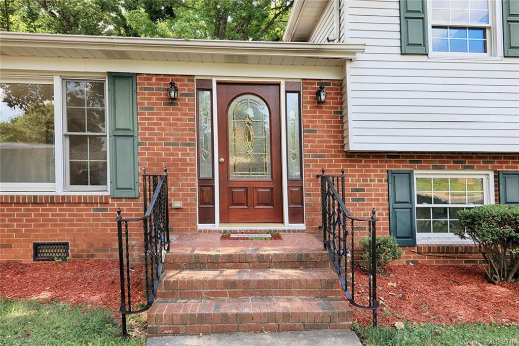 3327 Woodleaf Road Charlotte, NC 28205 - Photo 2 of 36 a front view of a house with a porch