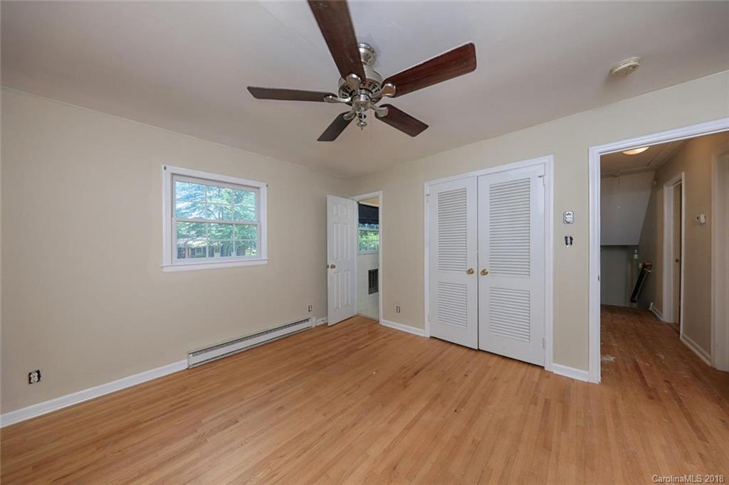 3327 Woodleaf Road Charlotte, NC 28205 - Photo 19 of 36 a view of empty room with wooden floor