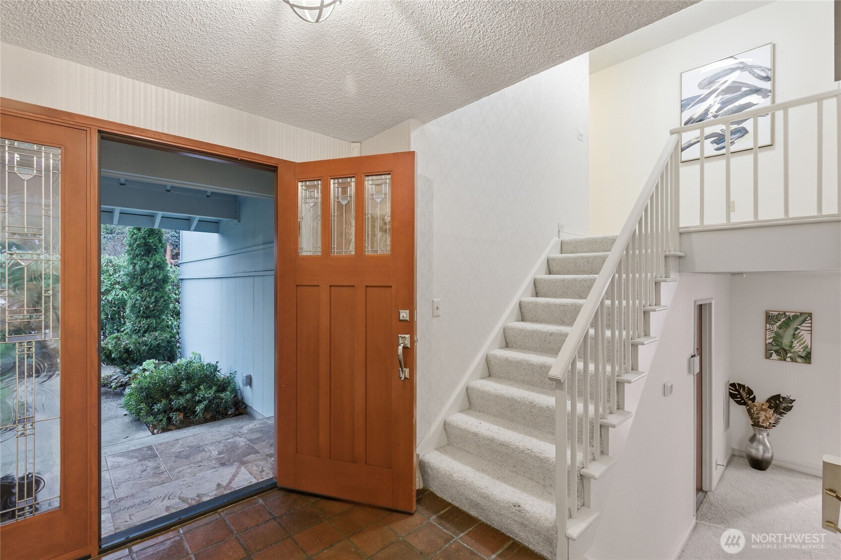 14523 Southeast 167th Street Renton, WA 98058 - Photo 13 of 39 a view of staircase with white walls and door