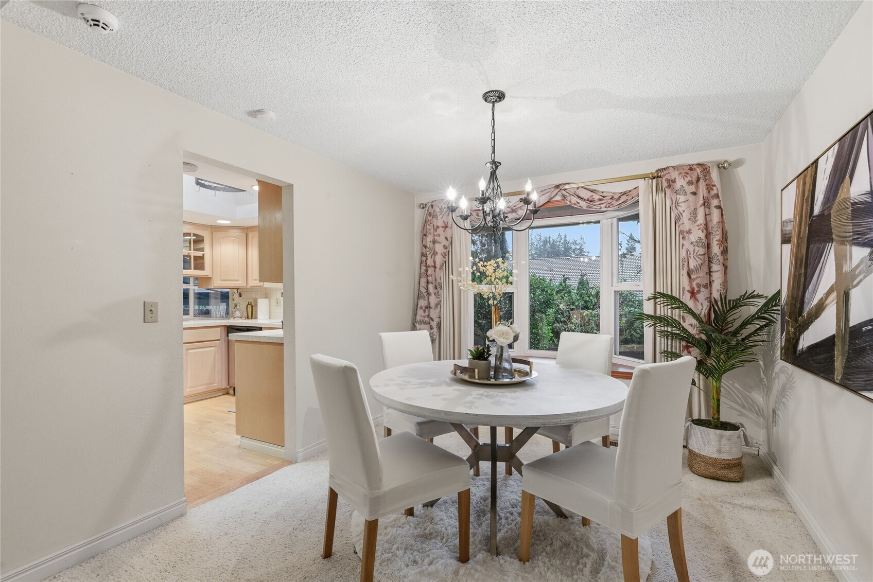 14523 Southeast 167th Street Renton, WA 98058 - Photo 21 of 39 a view of a dining room with furniture window and wooden floor
