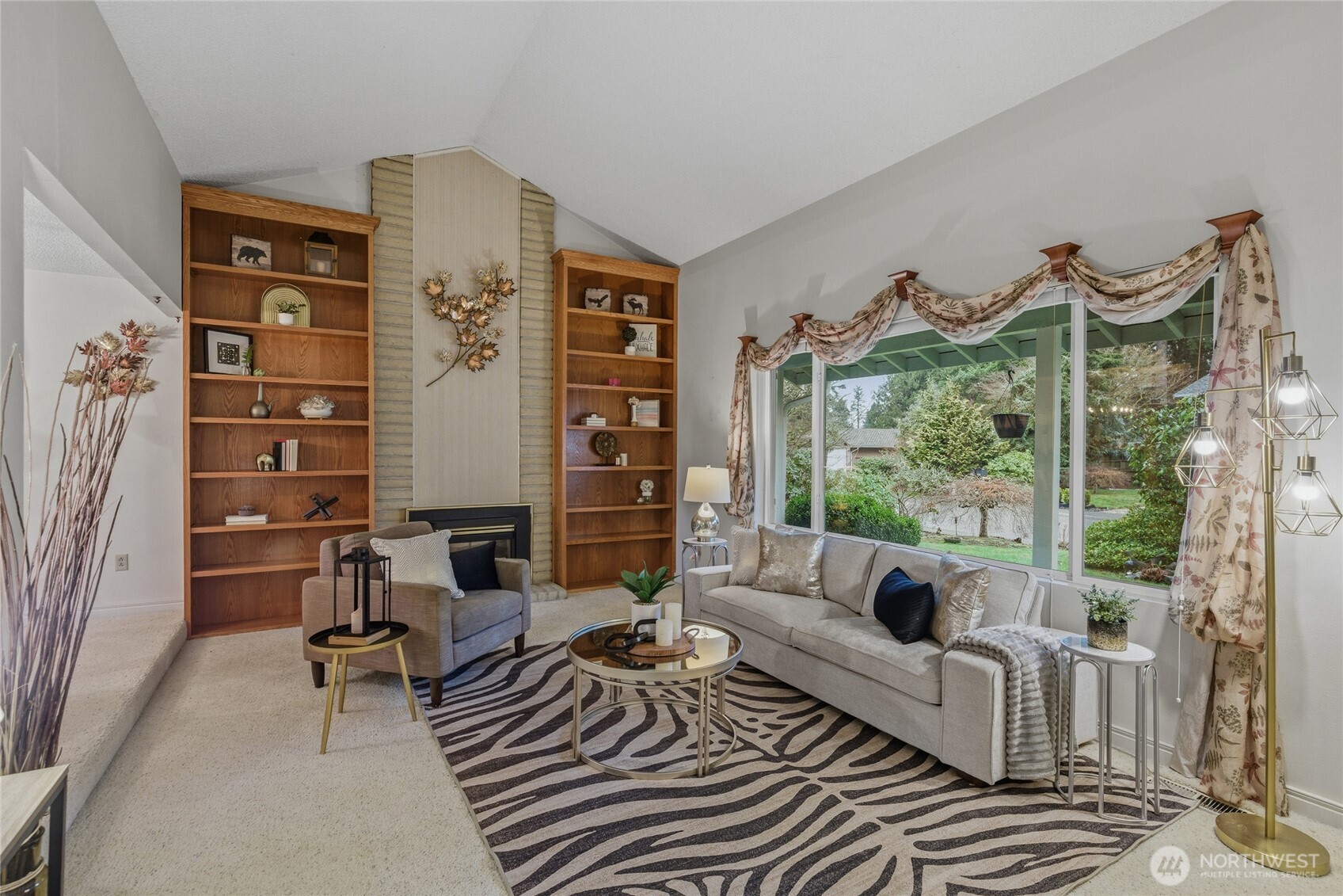 14523 Southeast 167th Street Renton, WA 98058 - Photo 22 of 39 a living room with furniture and a large window