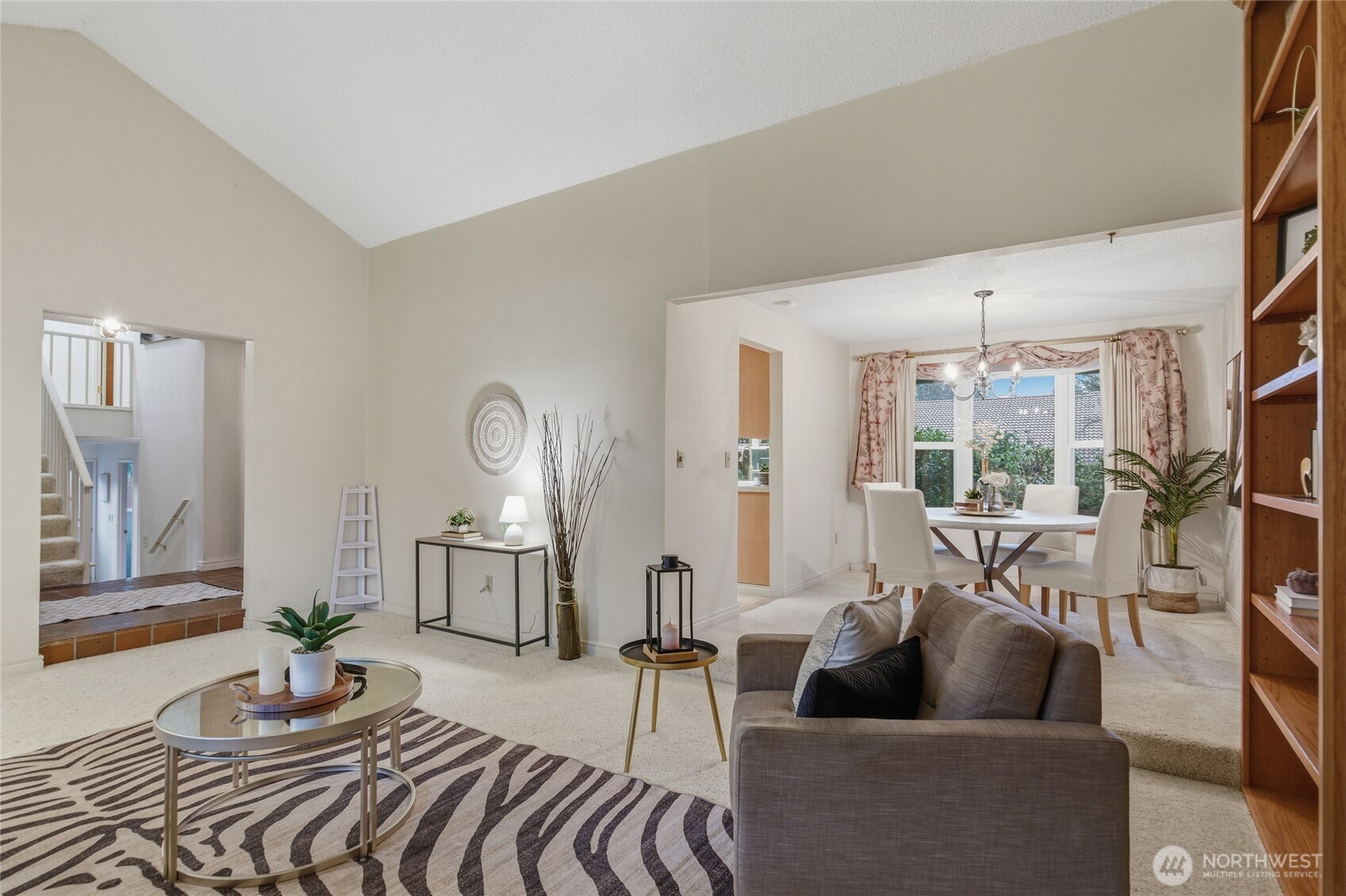 14523 Southeast 167th Street Renton, WA 98058 - Photo 23 of 39 a living room with furniture and a large window