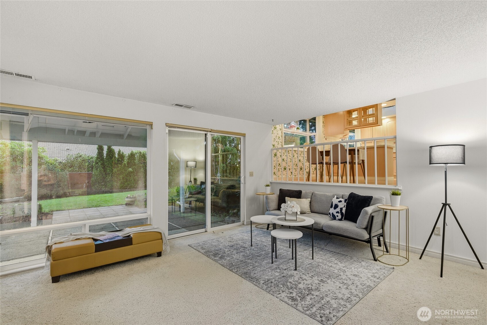 14523 Southeast 167th Street Renton, WA 98058 - Photo 25 of 39 a living room with furniture and a large window