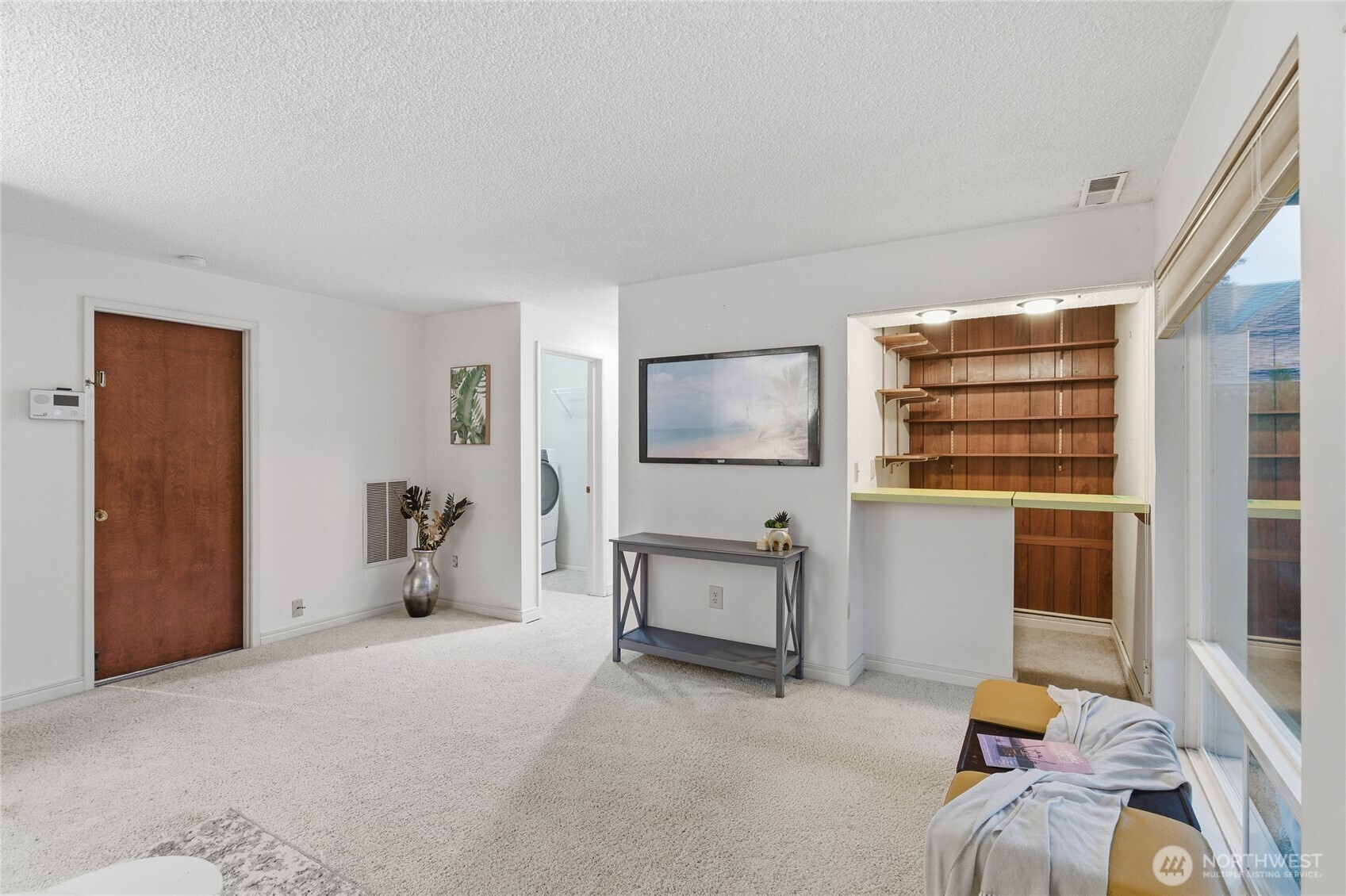 14523 Southeast 167th Street Renton, WA 98058 - Photo 28 of 39 a bedroom with furniture and a window