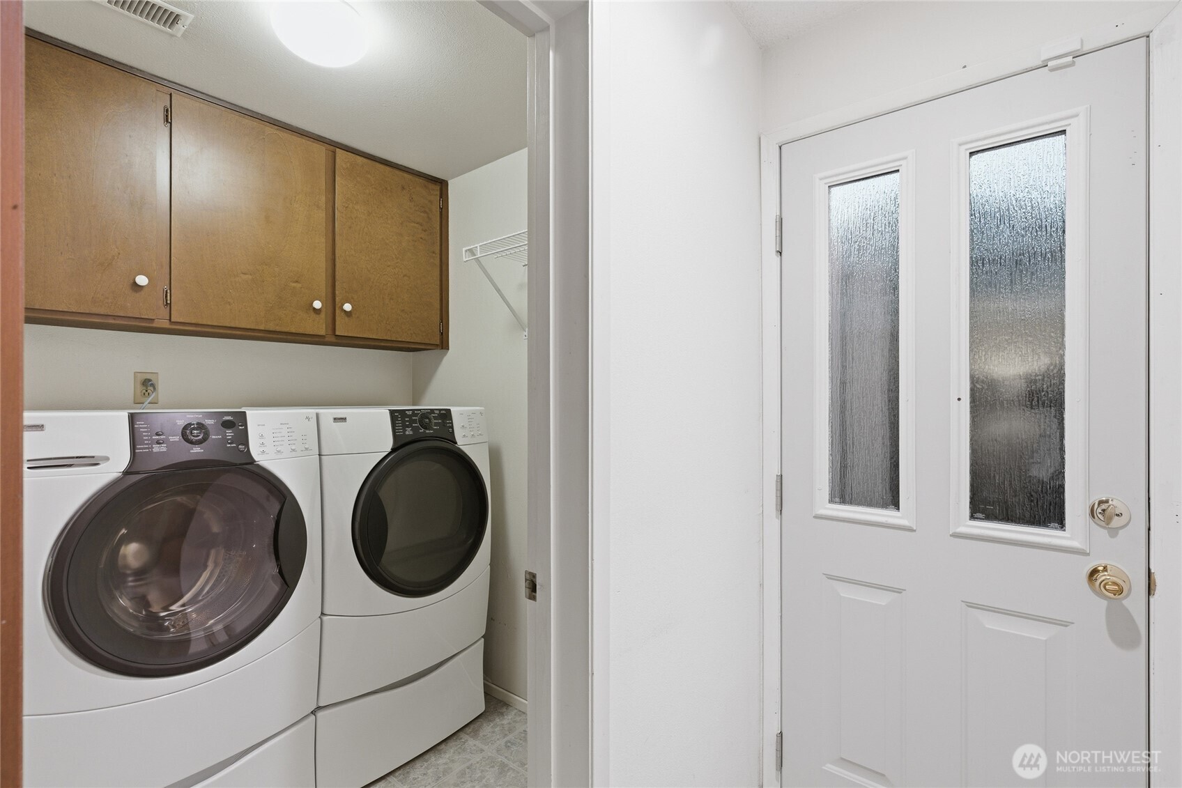 14523 Southeast 167th Street Renton, WA 98058 - Photo 31 of 39 a utility room with dryer and washer