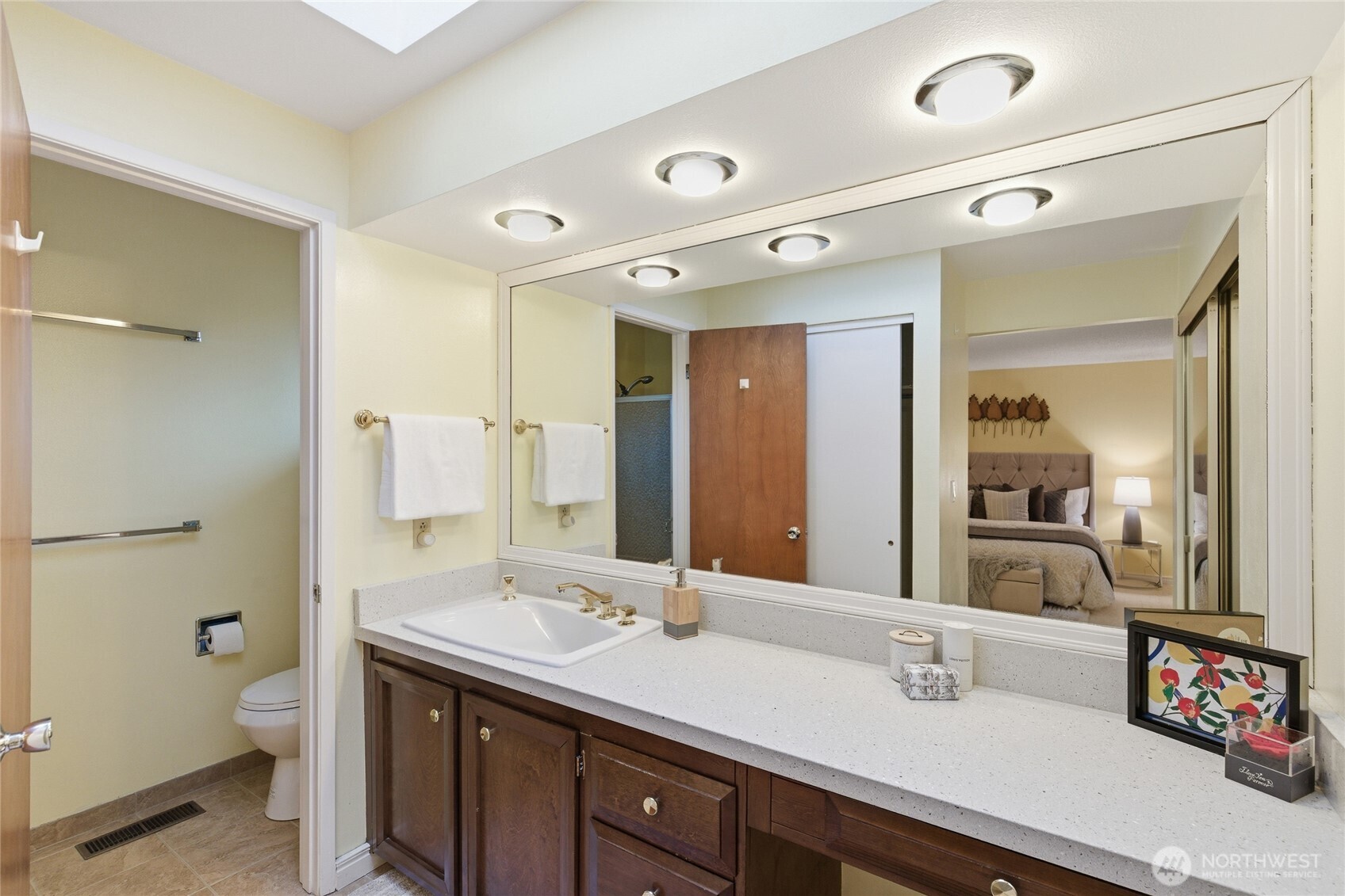 14523 Southeast 167th Street Renton, WA 98058 - Photo 33 of 39 a spacious bathroom with a double vanity sink mirror and toilet