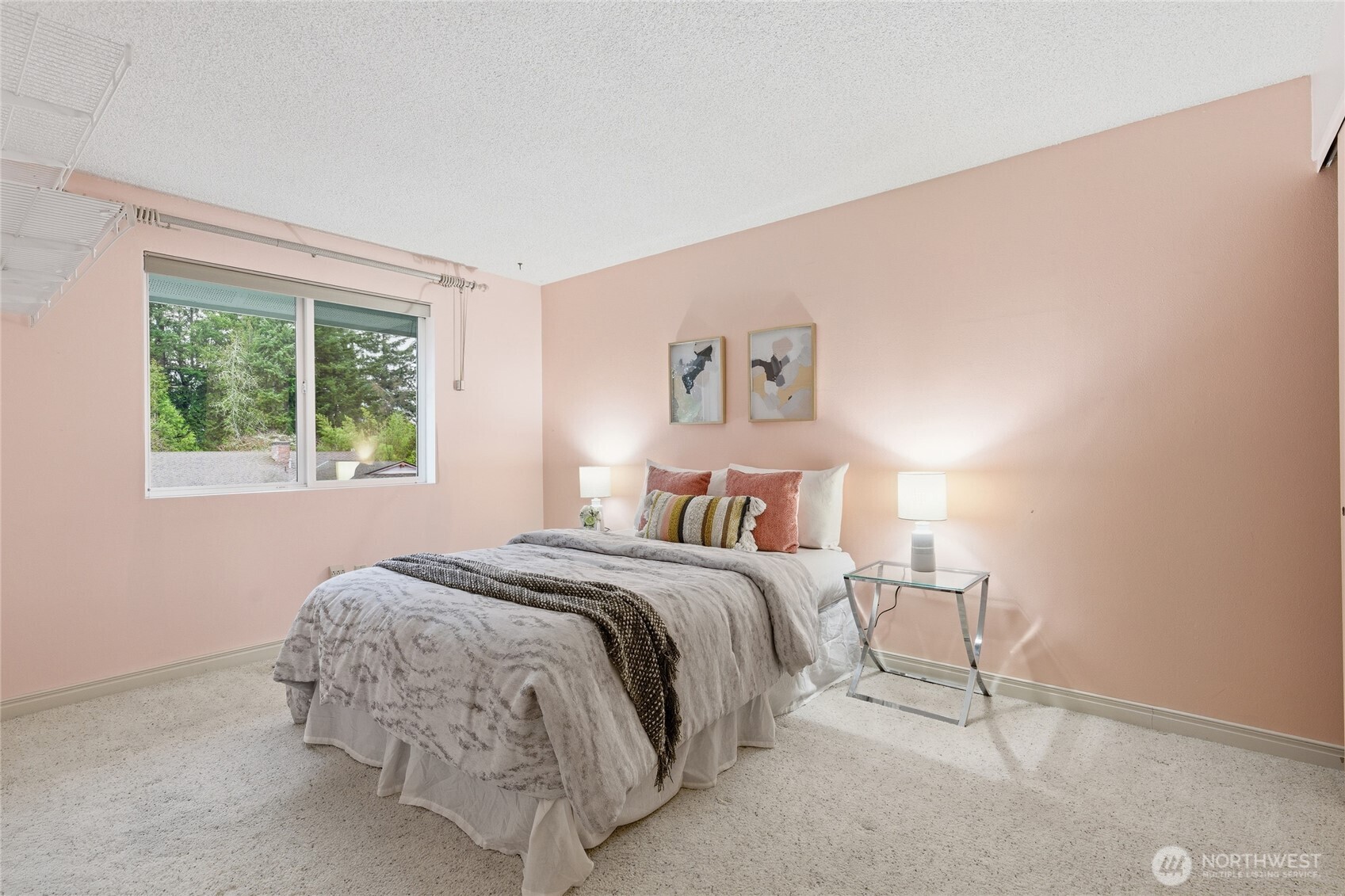14523 Southeast 167th Street Renton, WA 98058 - Photo 35 of 39 a bedroom with a bed and a window